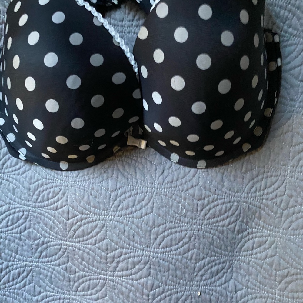 Victoria’s Secret black with white polkadots. 38D